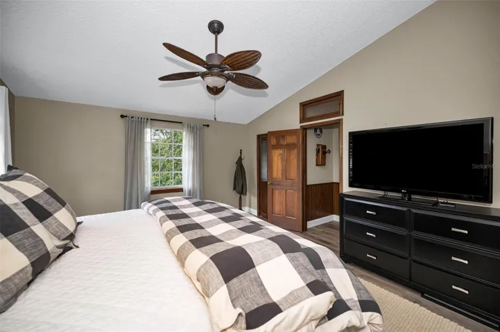 Bedroom with transoms that open and close over doorway
