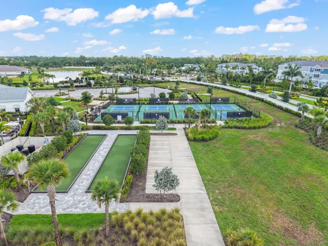 Arial view of bocce courts and pickleball courts.