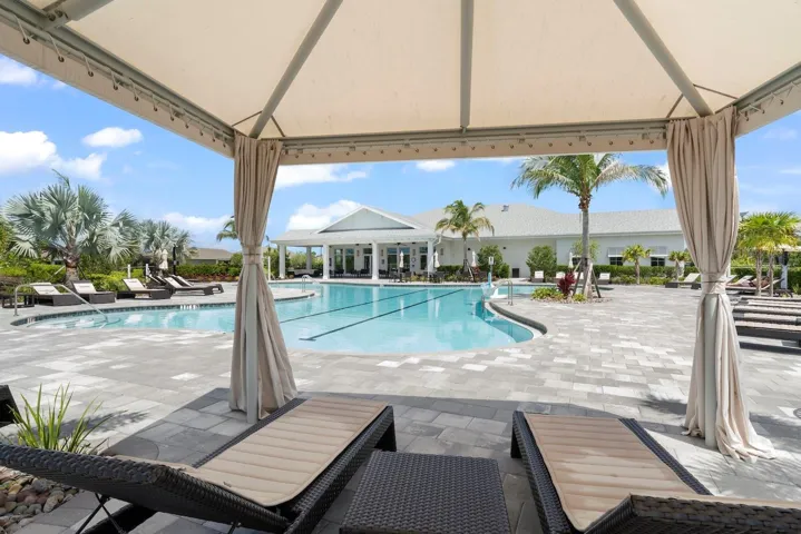 Cabanas lining the resort style pool.