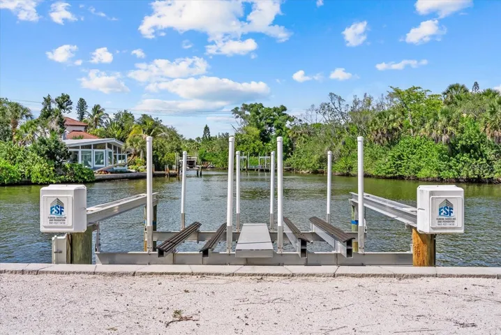 Electric lift for 2 jet skis or kayaks; ladder into Canal and additional boat docking space with tie ups for guests.