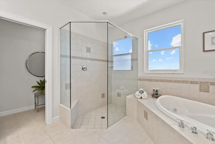 Primary bathroom with separate tub and shower, as well as a water closet with bidet.