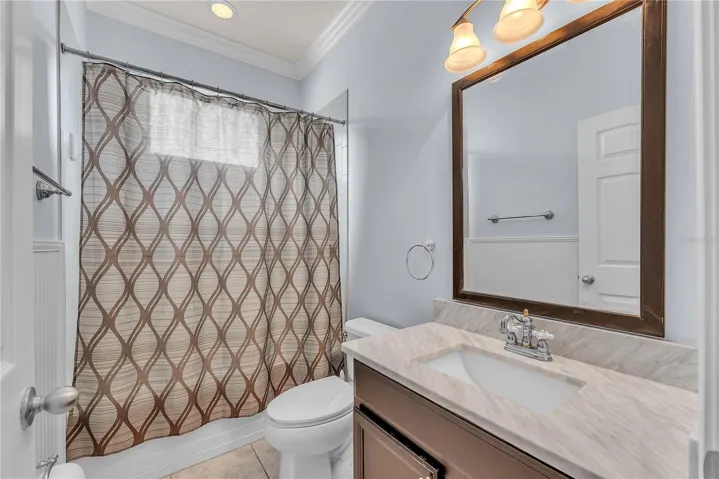 Bathroom #3 is located at the front of the home and has a tub/shower combo.