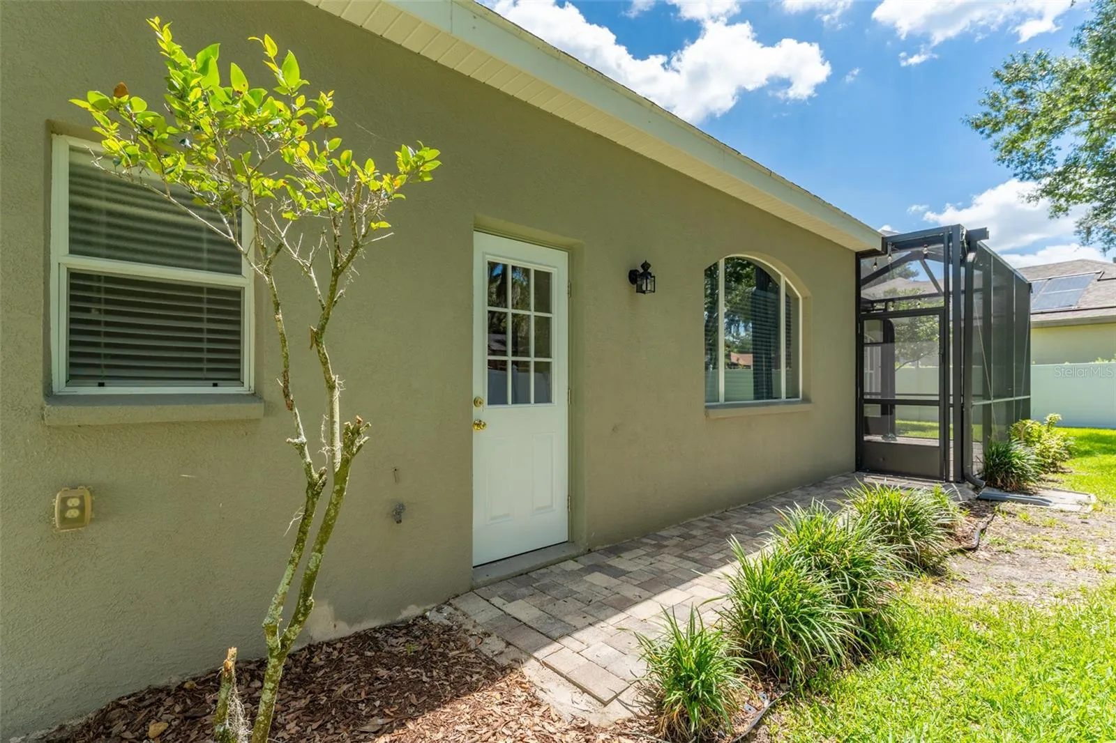 Brand New Door with Paved Walk Way