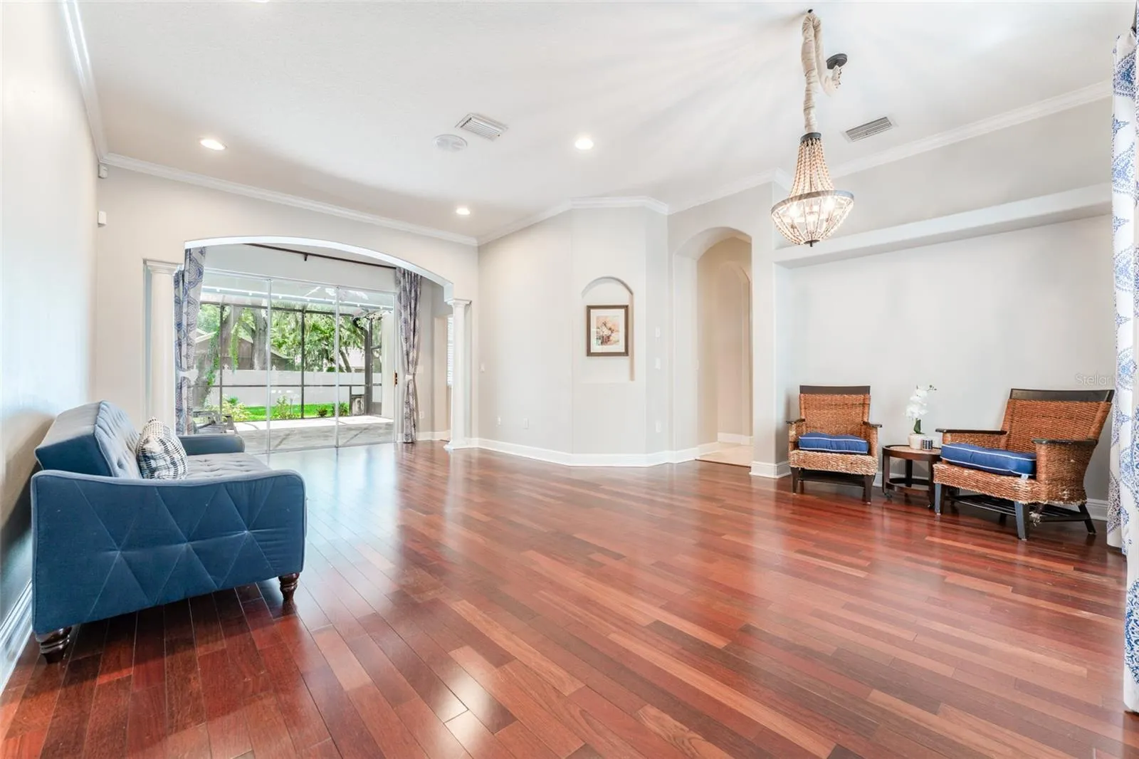 Formal Space with Wood Flooring and Loads of Natural Light