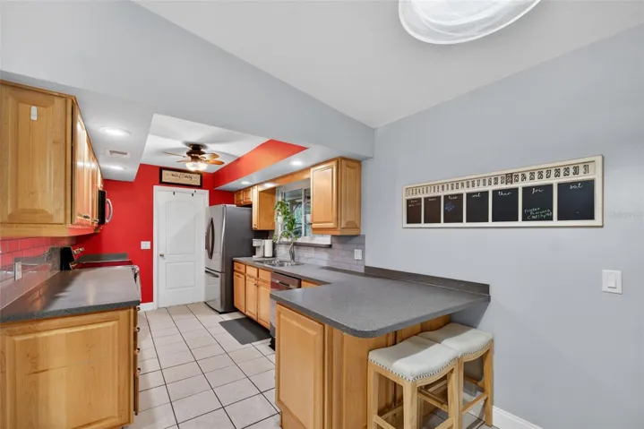 Stainless Appliances and Corian Counter Tops