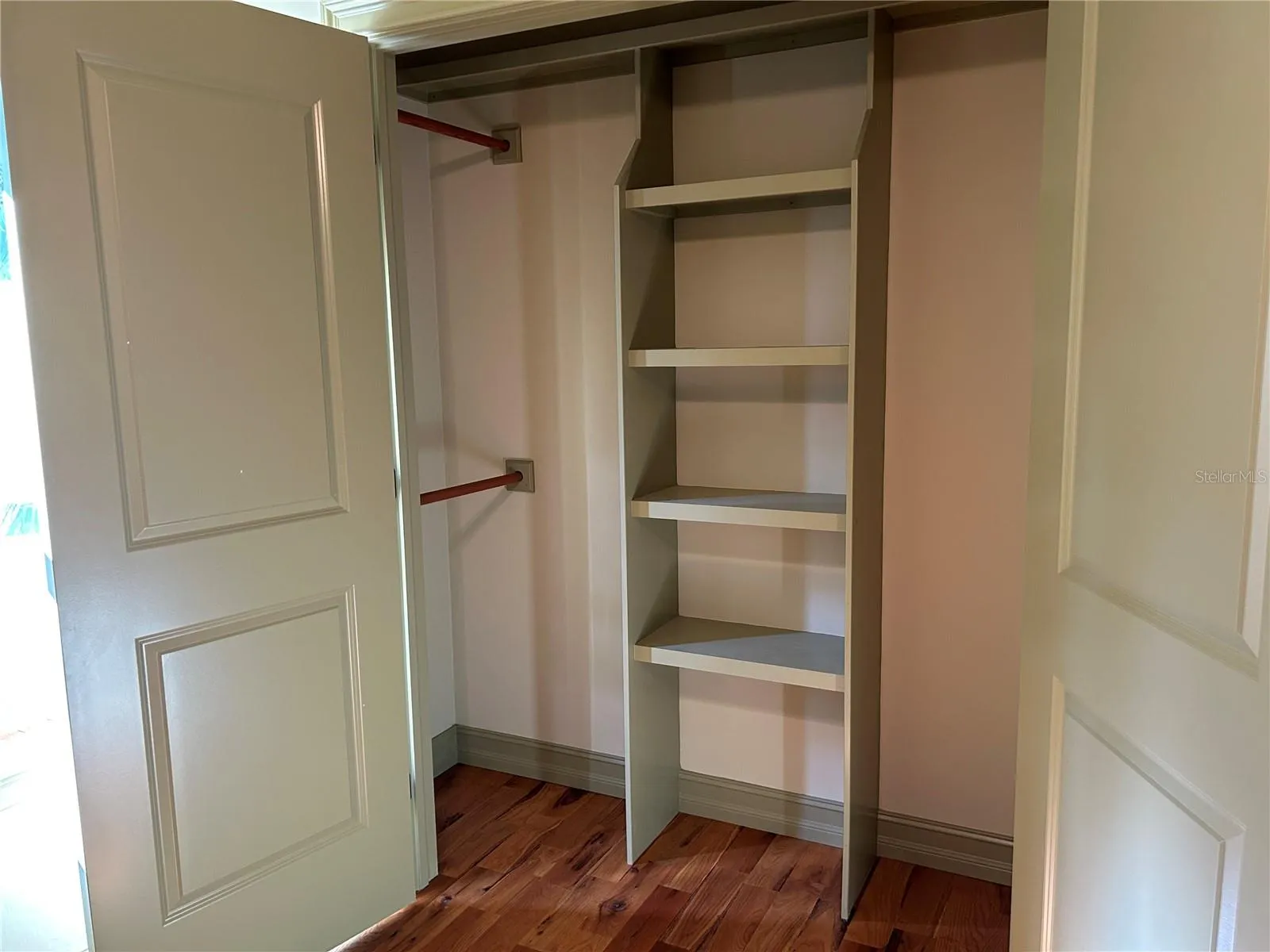 Bedroom 3 custom wood shelving