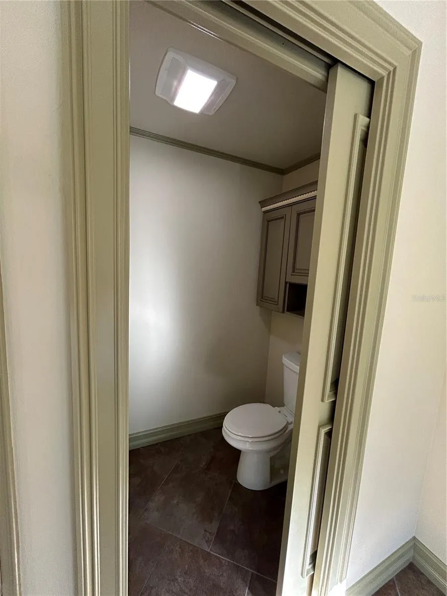 Primary Bedroom Bath oversized toilet room