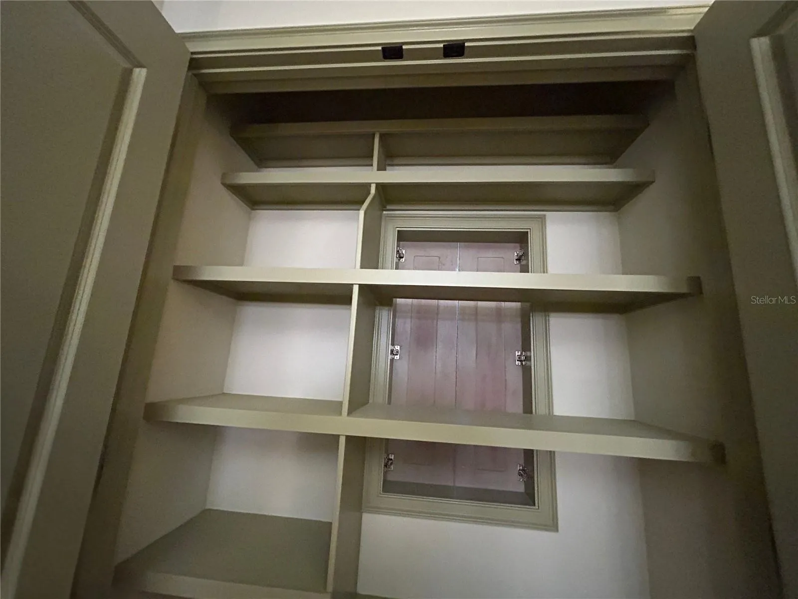 2nd floor hallway Linen Closet with access to guest bath toilet and shower room