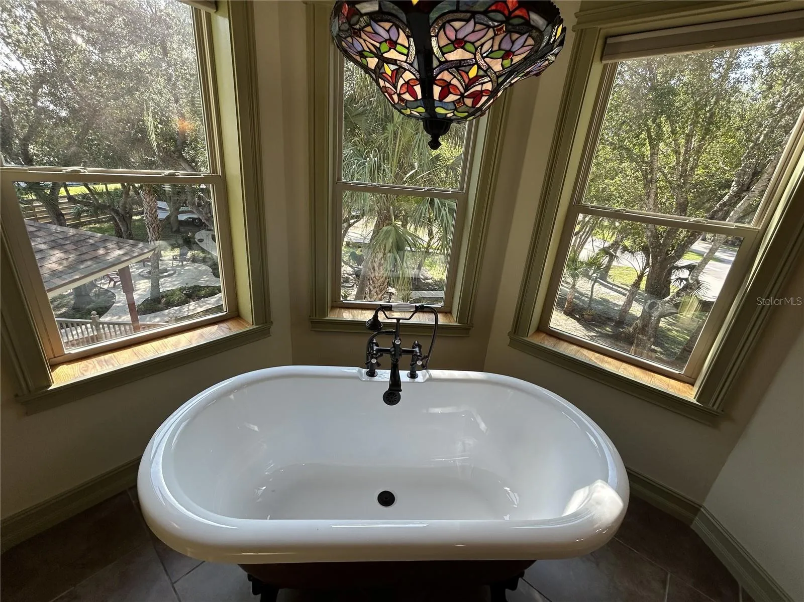 Primary Bedroom Bath soaking tub in angled bay