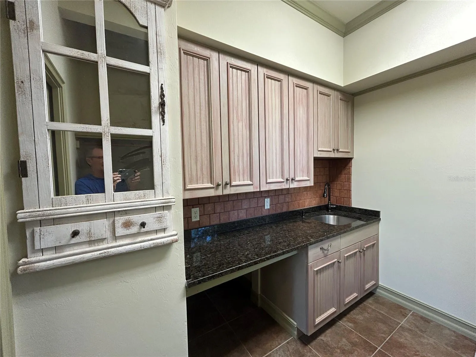Large area under counter which goes under staircase for storage or large pet cage
