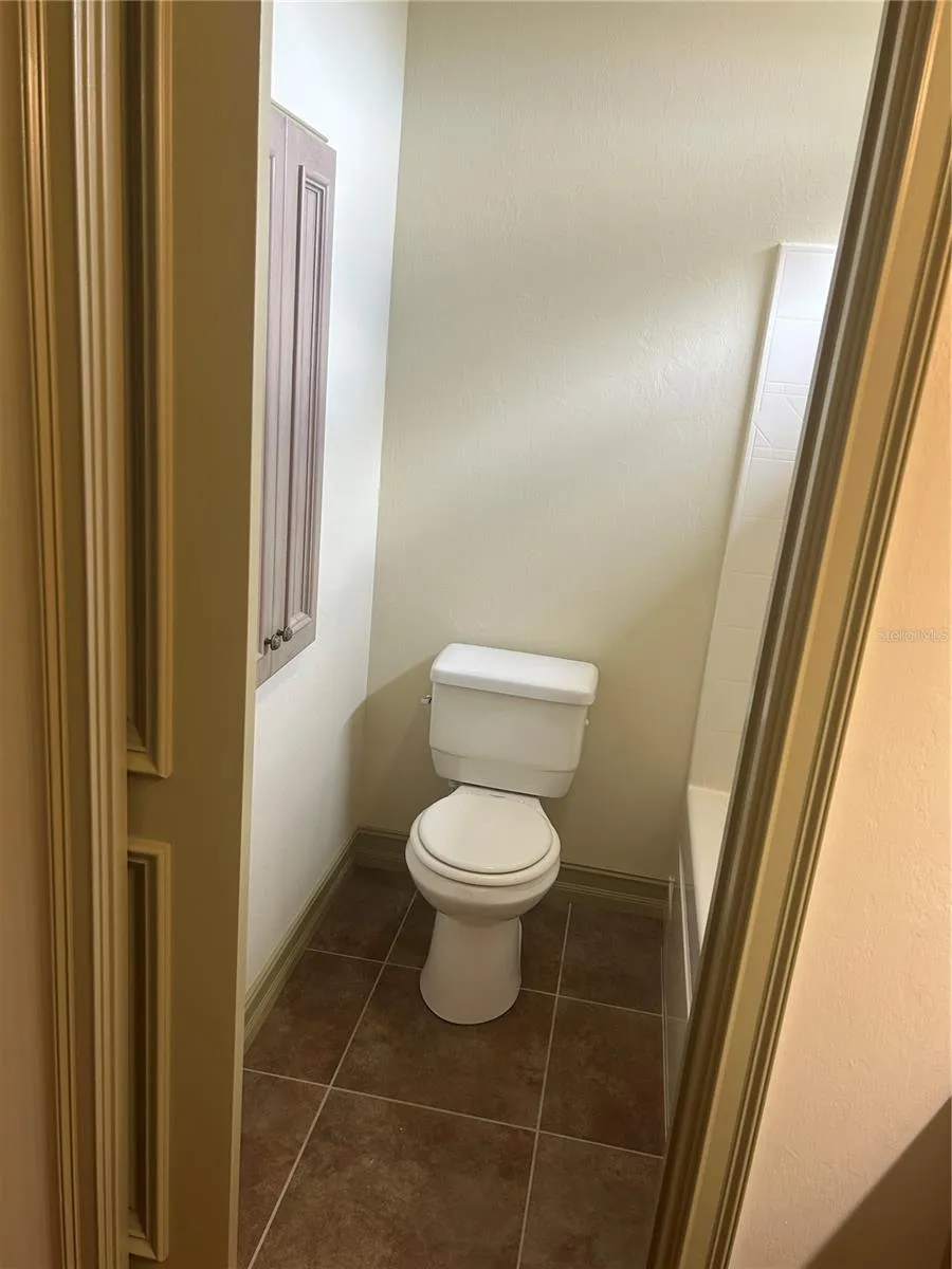 2nd floor hall bath toilet / shower room with access to linen closet