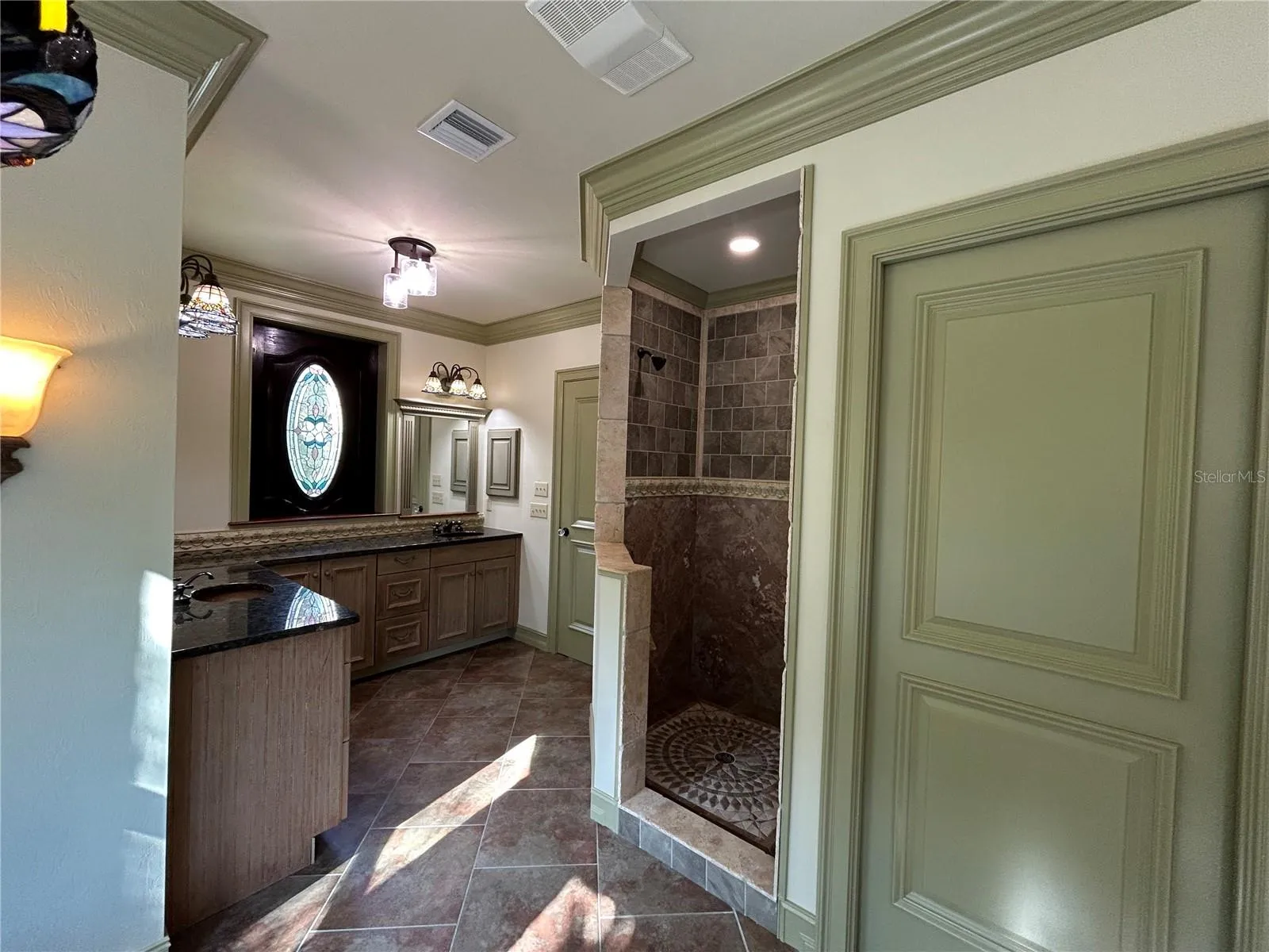 Primary Bedroom Bath with warming fan at shower entrance