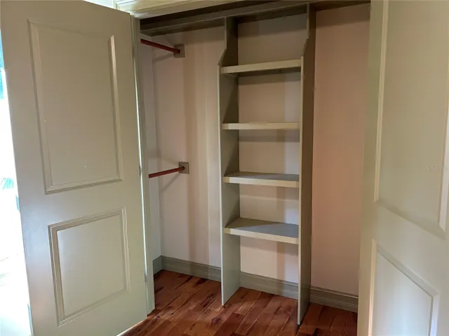 Bedroom 3 custom wood shelving