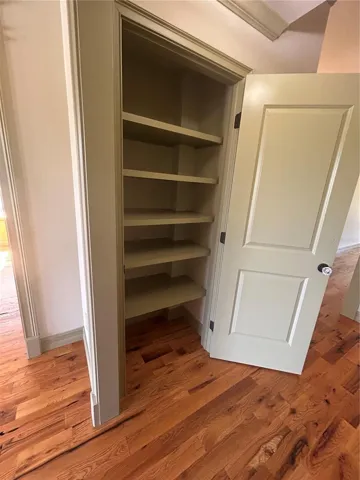 Breakfast Nook hall Pantry. Wood shelving throughout entire home.