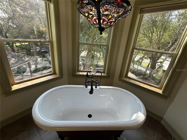 Primary Bedroom Bath soaking tub in angled bay