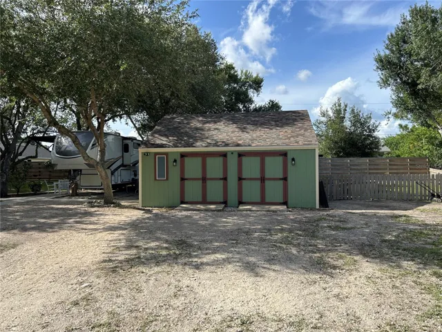 Lot 3 | 12 x 24 shed with structural storage and pool area behind
