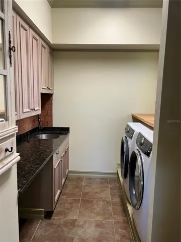 Excessive counter space and stainless steel utility sink