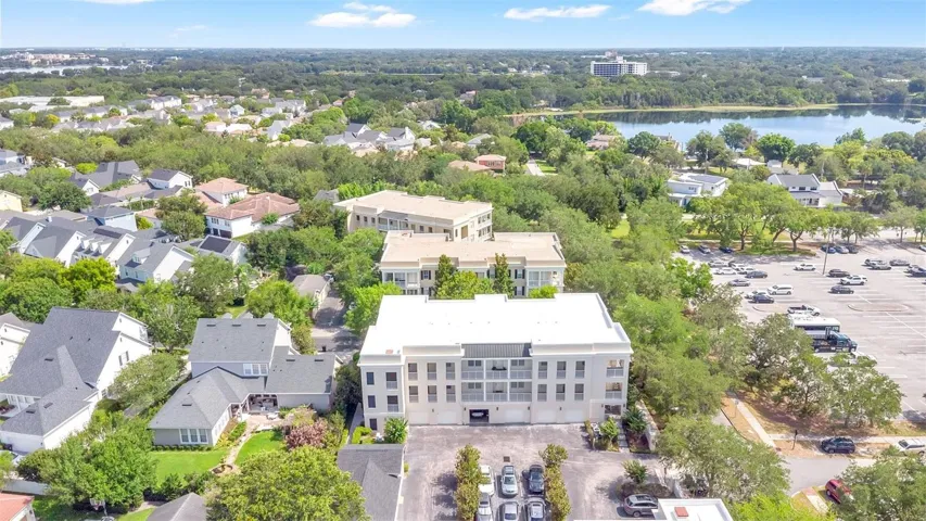 View looking north showing building breezeway and parking lot.
