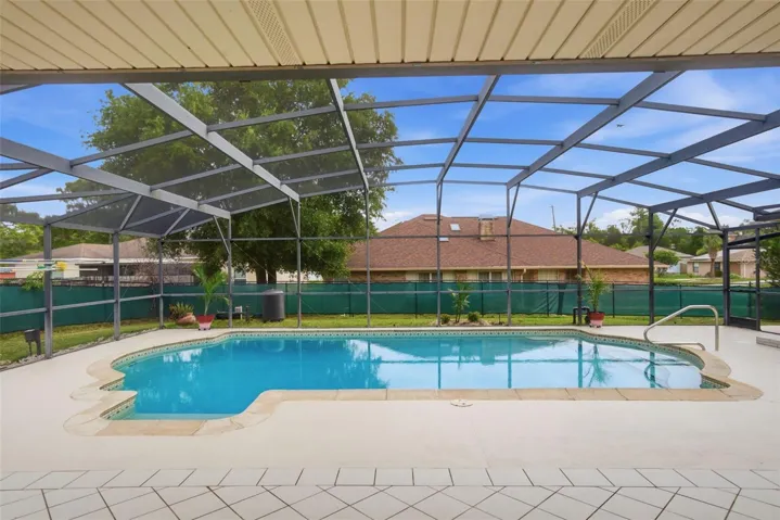 Back of 2202 Banbury!  Walk out from the living room to this gorgeous pool area!