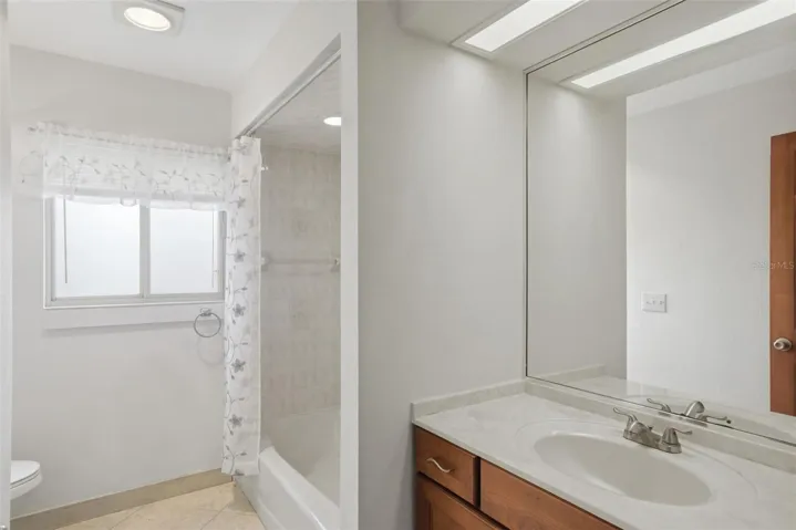 2nd bathroom with shower/tub combination.