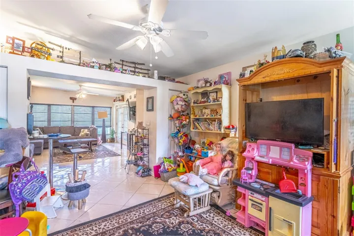 Living Room Looks Into Family Room
