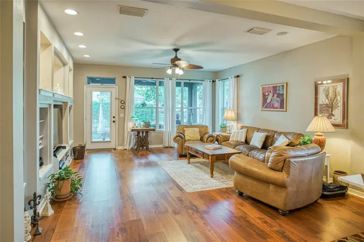 Family room with door leading to lanai area