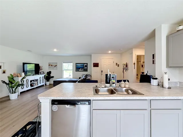 the kitchen looking to the living room