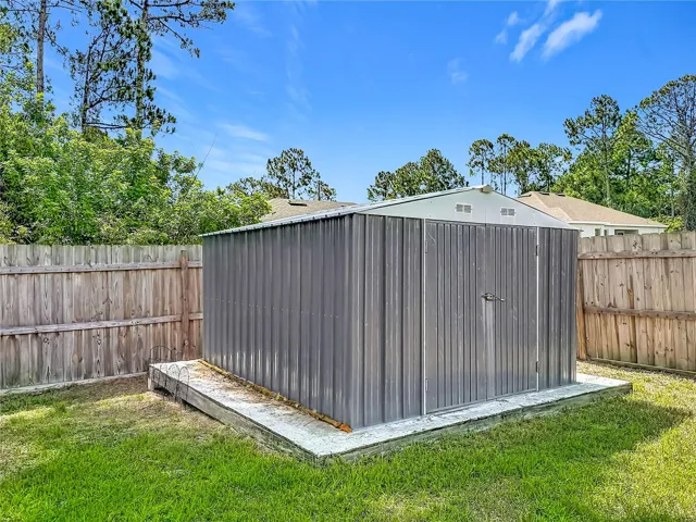 the shed is in the back corner of the lot