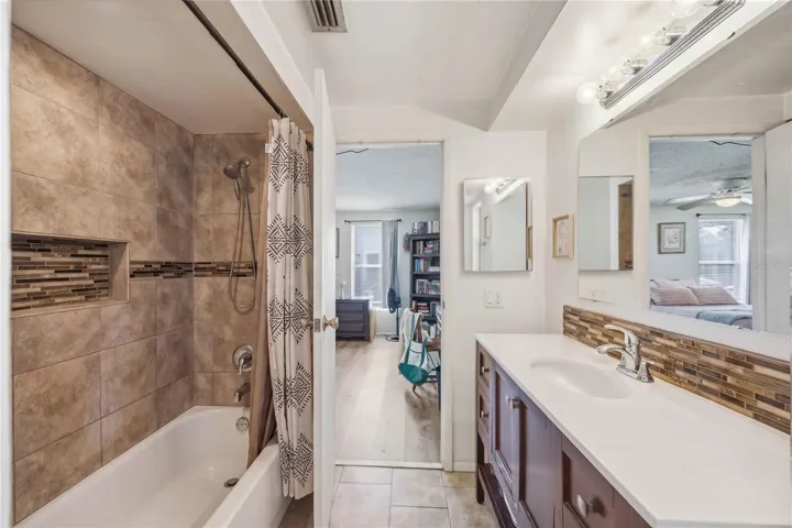 PRIMARY BATHROOM - TILED TUB AND SHOWER