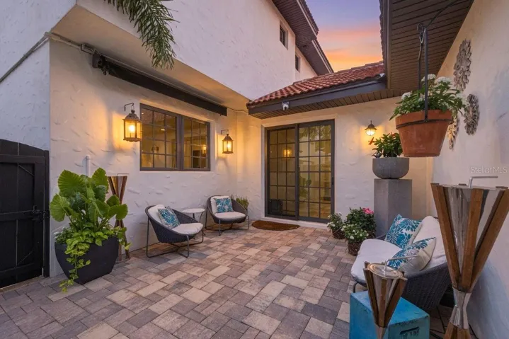 Private back courtyard with sun shade.