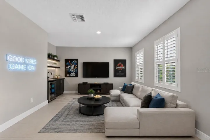Virtually staged up stairs bonus room