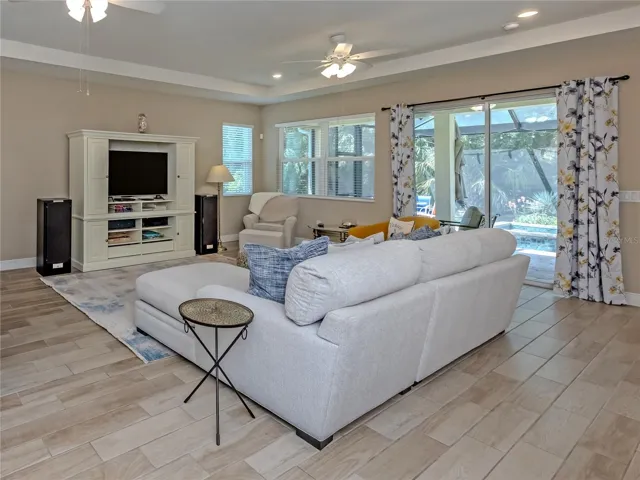 Picturesque views of the sparkling pool with forever view screen!
