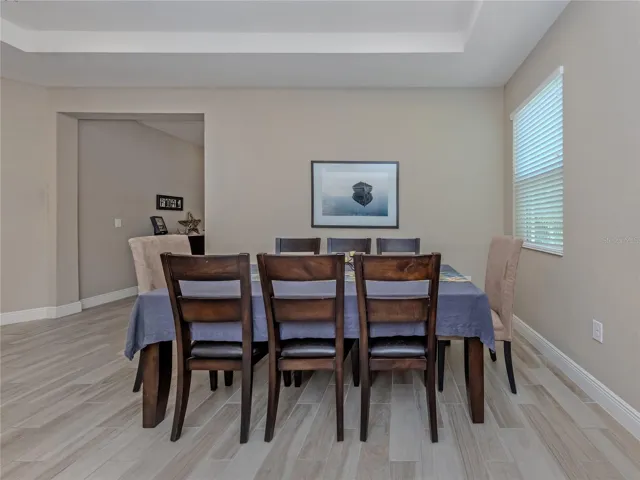 The dining space is large and near the kitchen making serving those special meals a breeze