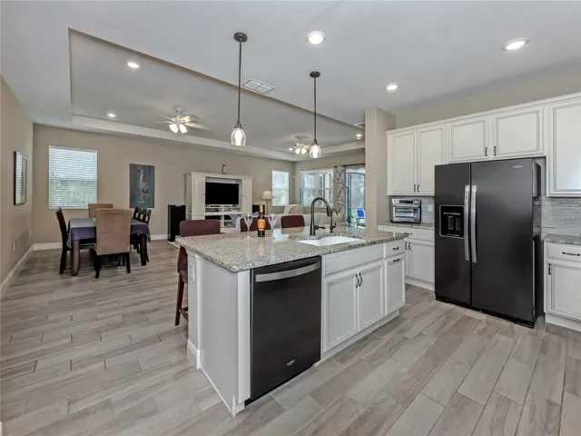 The stainless appliances compliment this beautiful kitchen!
