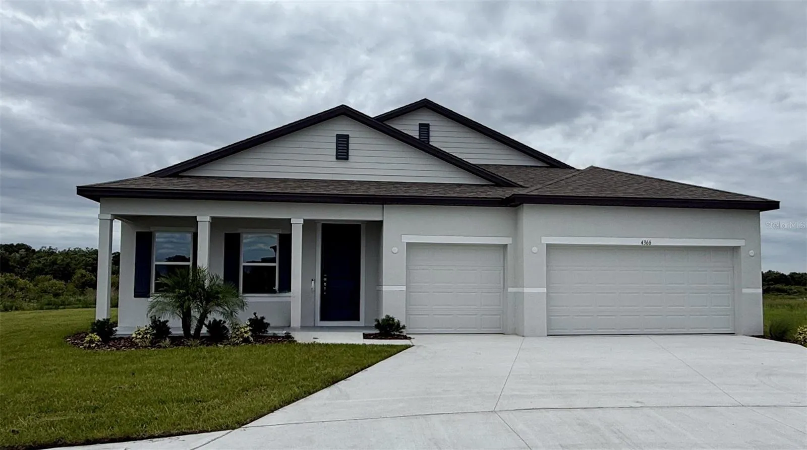 Stunning Exterior - Block construction, 3 car garage
