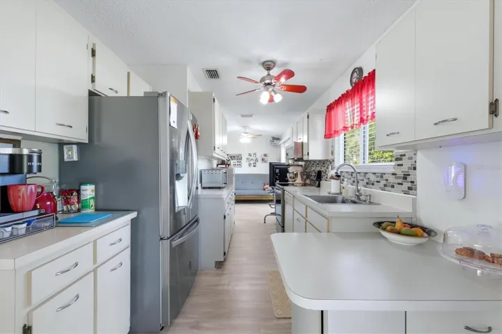 Galley kitchen with lots of cabinets
