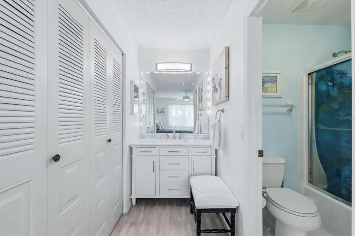Bathroom off of master bedroom with new updated cabinetry