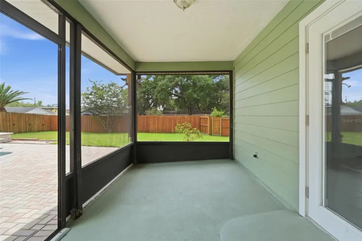 Screened in patio off the primary bedroom