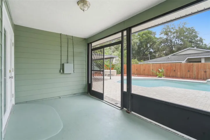 Screened in patio off the primary bedroom