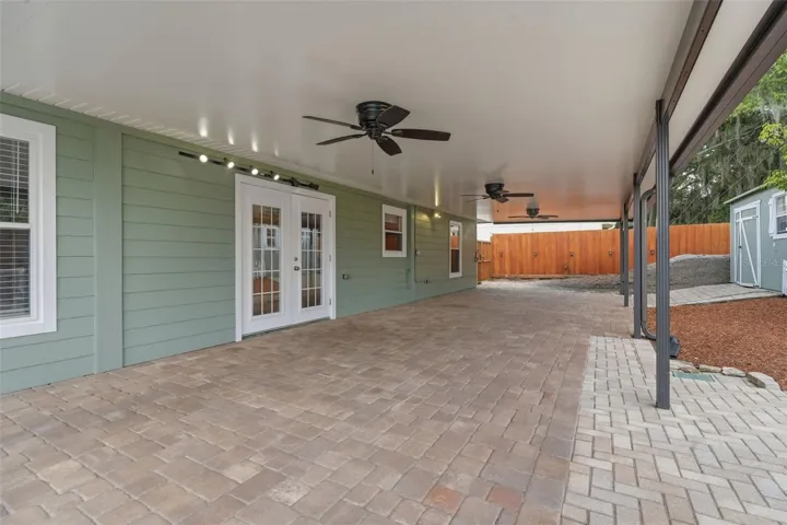 Check out this back porch with 3 fans!!