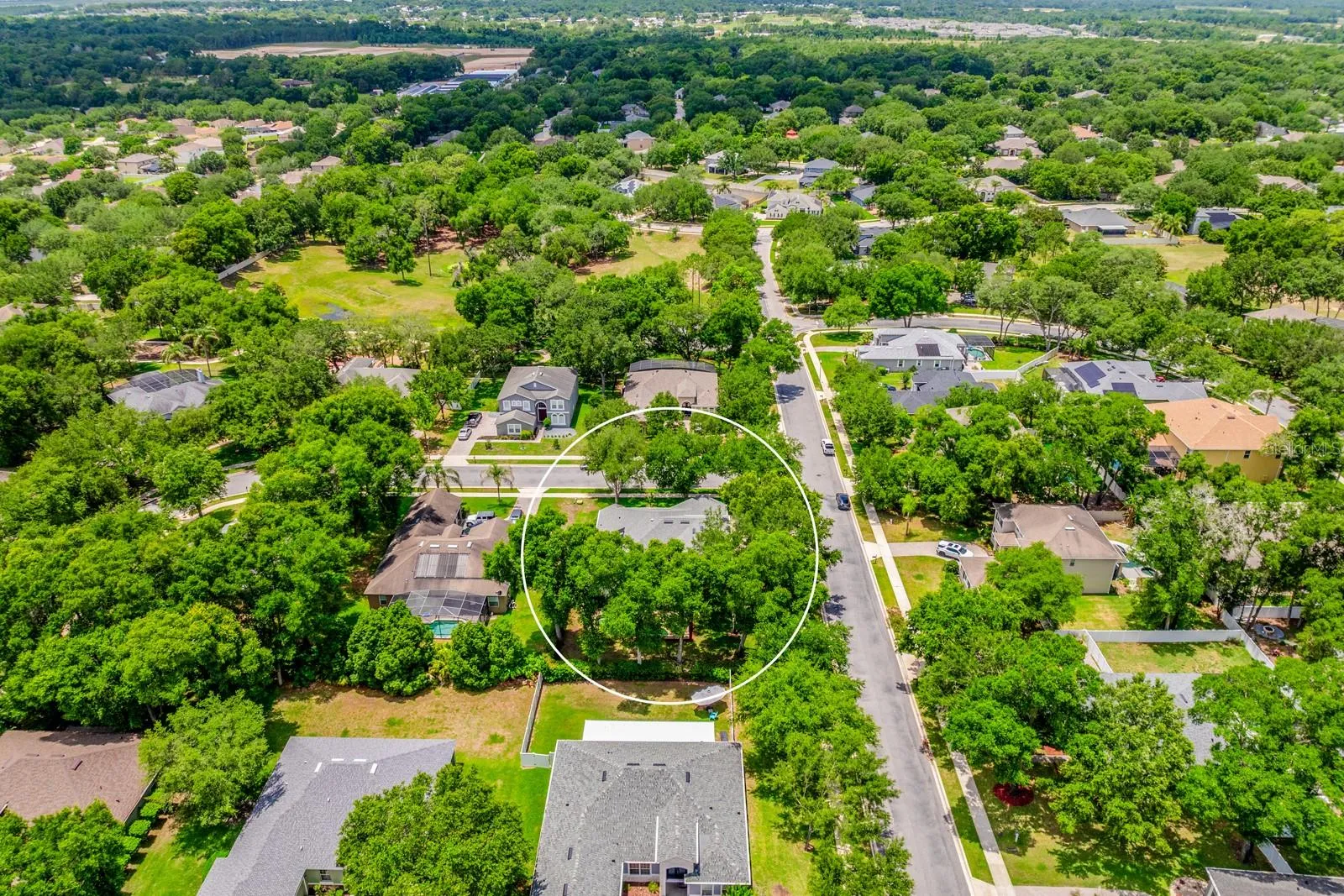 Surrounded by mature trees.