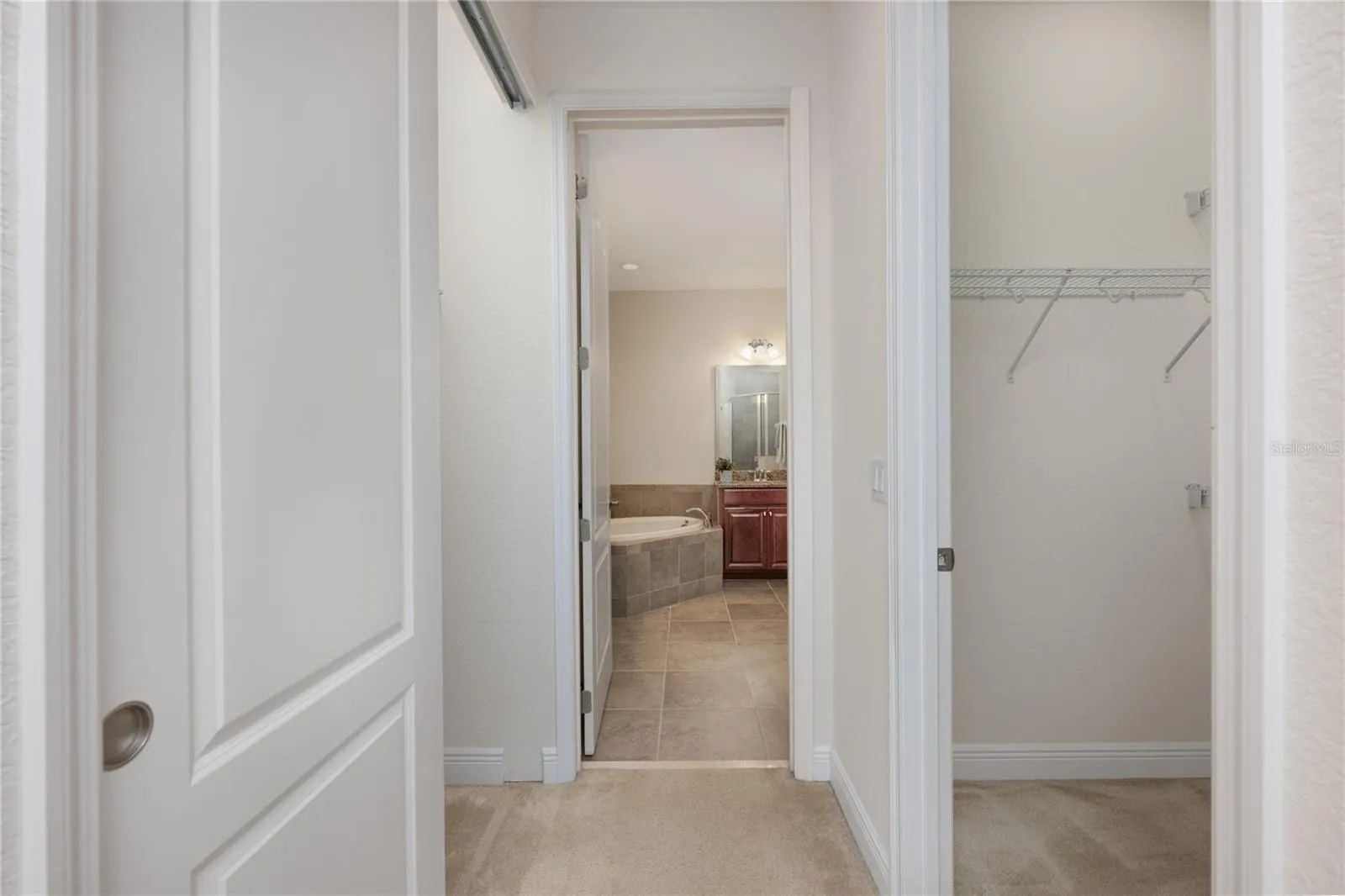 Hallway and dual closets
