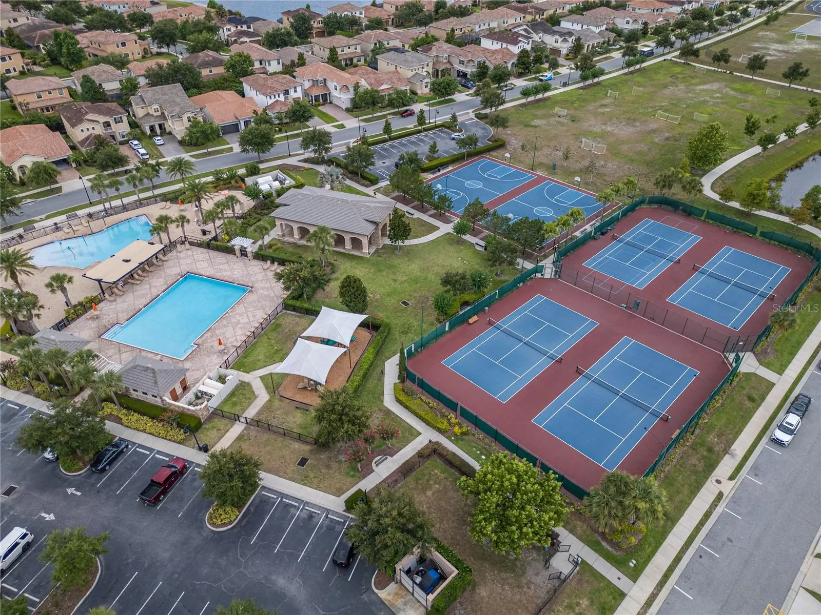 Recreational amenities: community pools, playground, pavilion, basketball courts, and tennis courts