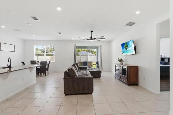 Spacious family room offering flexible living space to easily accommodate your personal design style and furnishings.