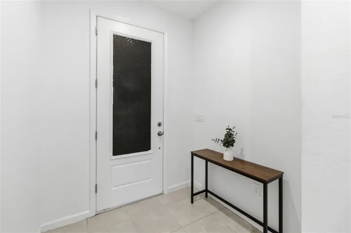 The spacious front foyer welcomes you with natural light and an open feel.