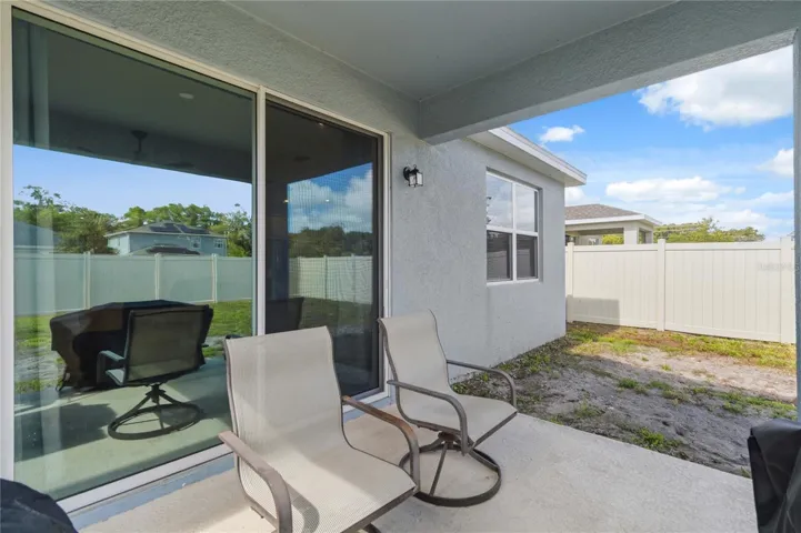 Enjoy peaceful mornings and laid-back weekends from the comfort of the back porch.