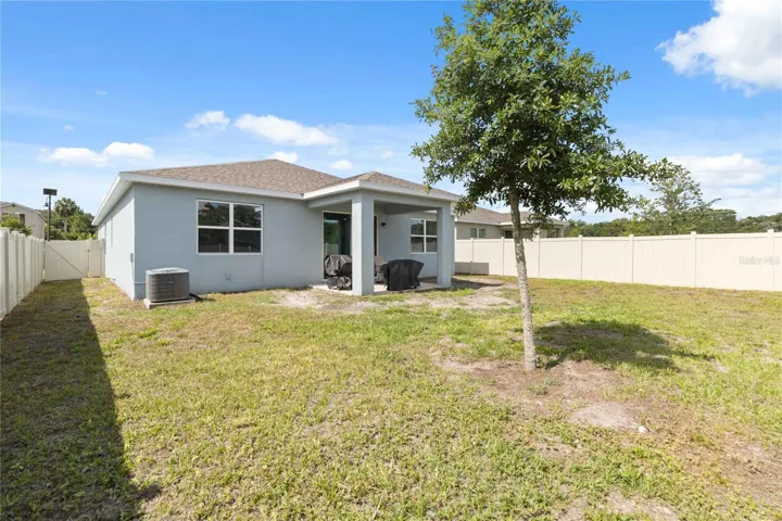 Fully fenced backyard provides added privacy and plenty of room to relax or entertain for people and pets.