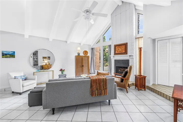 Floor-to-ceiling windows and vaulted ceilings.