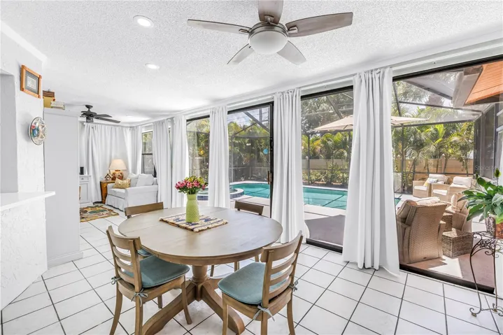 Versatile dining room with pool views.