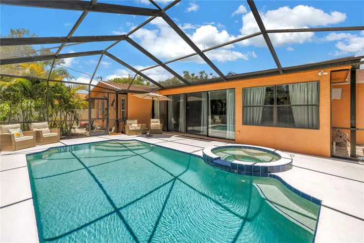 Back yard oasis offers a 2024 resurfaced pool and spa!